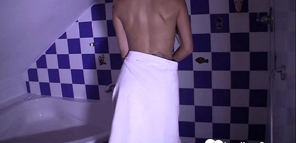  Horny stepsister masturbates while taking a shower
